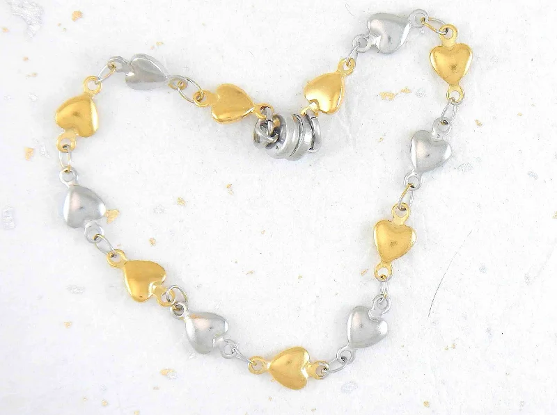 Bracelet with alternating tiny gold and silver hearts, magnetic clasp, all hypo allergenic stainless steel