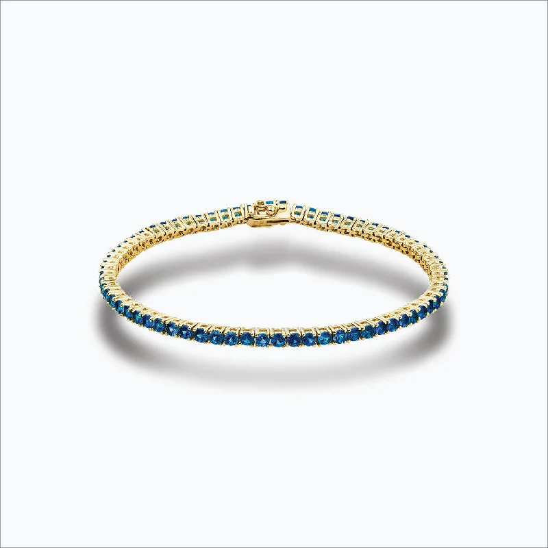 Tennis 18K Gold Bracelet w. Blue Sapphires