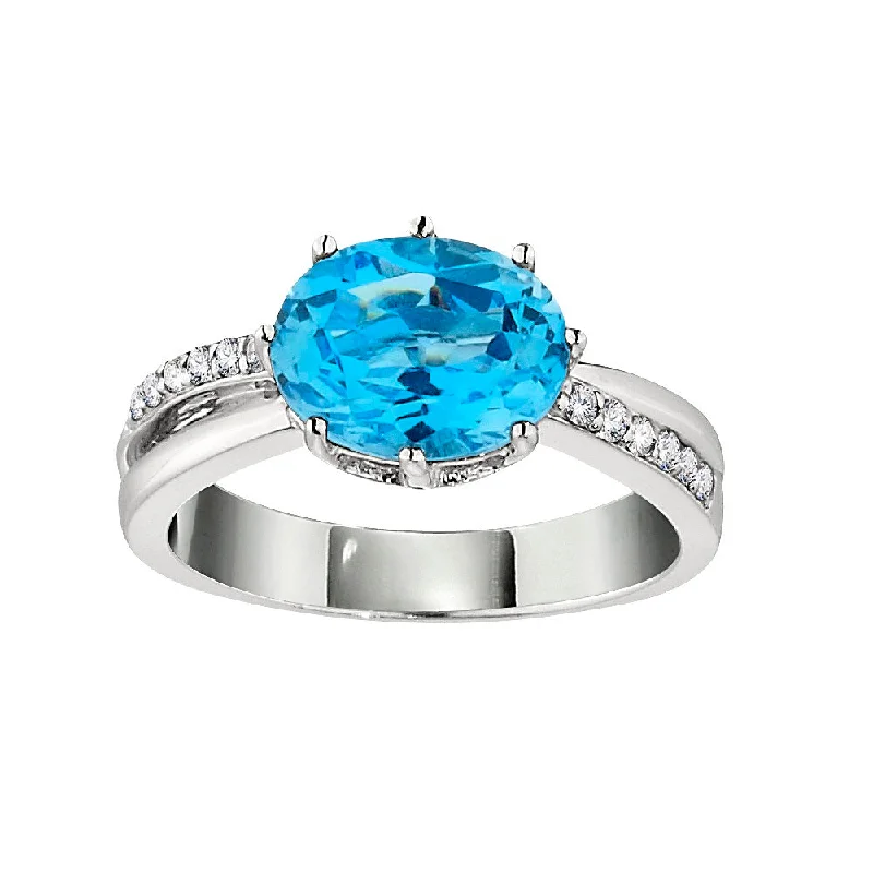 Oval Blue Topaz and Diamond Ring