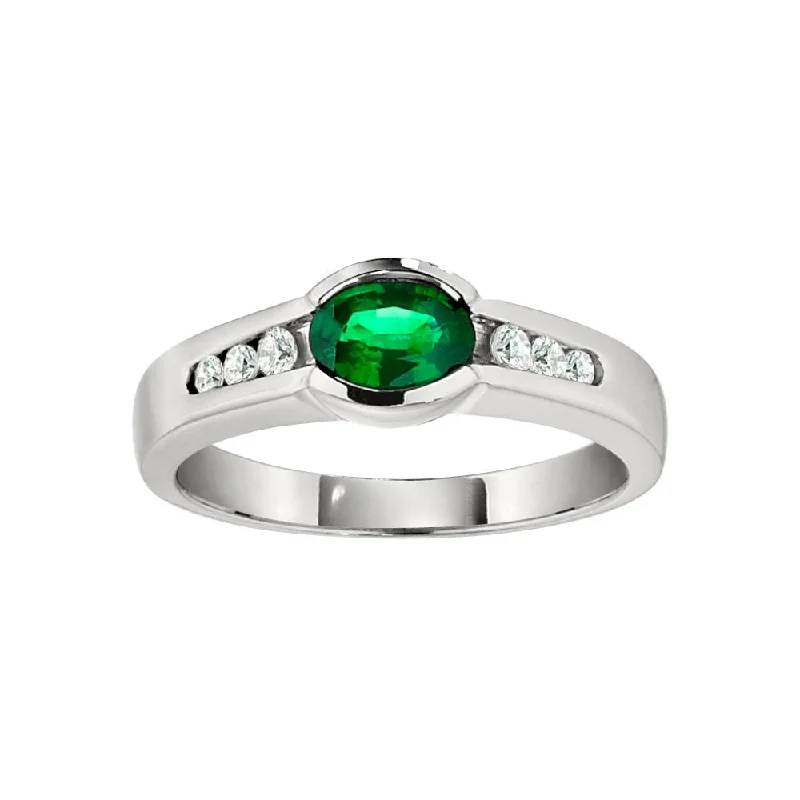 Modern Bypass Emerald and Diamond Ring